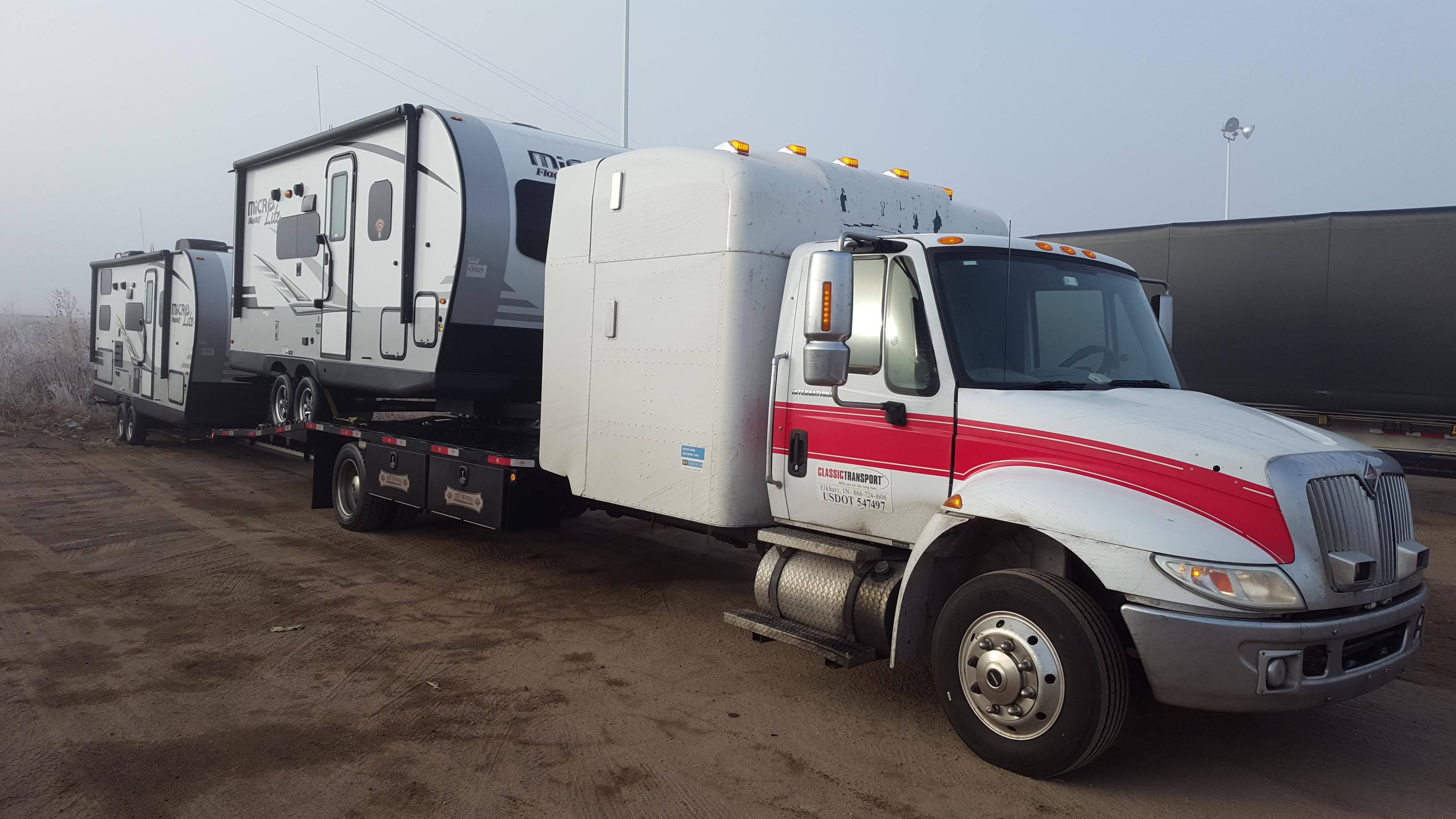 Truck hauling two campers