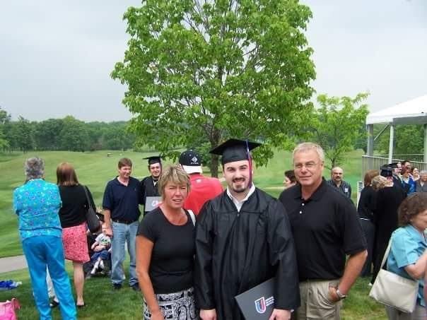 me at graduation with me parents